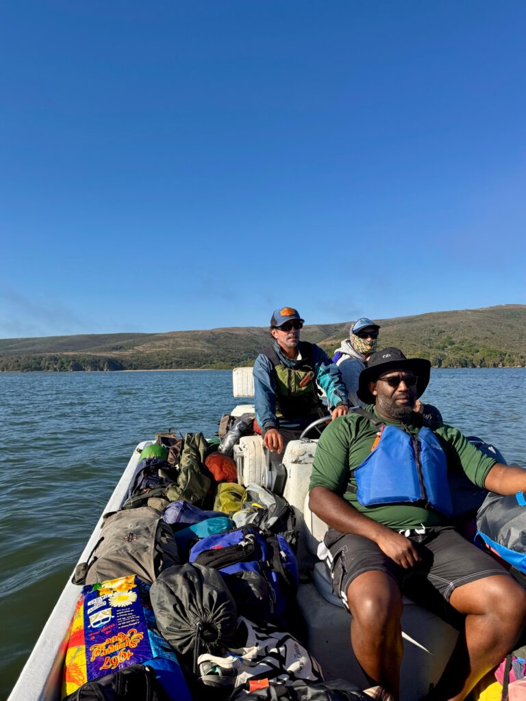 Motor Boat Suppor bringing gear to kayak campers on Tomales Bay
